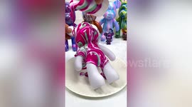 Satisfying videos show custom-made teddy bears being coated in colourful paint