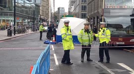 Woman killed by truck after collision near Victoria Station