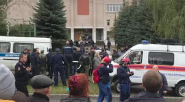 Russia school shooting: people and emergency services gathered outside building when shooter was still alive