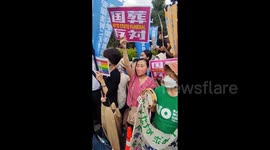 Communist Party secretary making speech at protest against Shinzo Abe state funeral in Tokyo, Japan