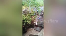 Tourists stranded on cliff during flash flood rescued in Thailand