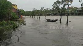 Floods in historic city of Hoi An, Vietnam, as Typhoon Noru makes landfall