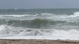Hurricane Ian Continues to Lash South Florida But That Didn't Keep Florida Man from Surfing