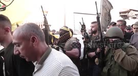 Mourners and militants attend the funeral of Palestinians who were killed by Israeli forces, in the Jenin refugee camp, near the West Bank city of the same name.