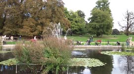 Autumn at picturesque Italian Gardens with ponds, fountains and swans - Kensington Gardens