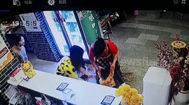 Hot soup spills over boy after he runs into waitress at restaurant in China