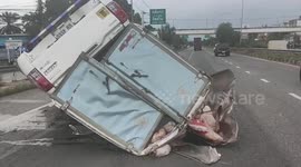 Pickup truck overturns after wheel blows out on highway in Thailand