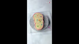 Artist beautifully turns cookie into an adorable pink slipper