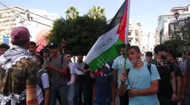 Palestinians take part in a protest against the killing of 4 Palestinians by Israeli forces