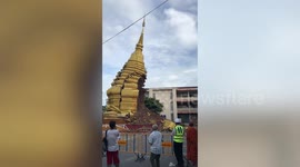 Ancient Buddhist pagoda COLLAPSES after being battered by rain as typhoon lashes Thailand