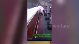 Alert cop helps passenger who fell while boarding moving train in central India