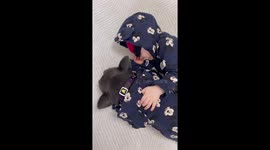 Frenchie is sleeping together with his 9 month old brother in matching mickey mouse outfits. Cutest thing ever!