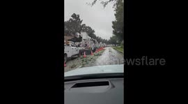 Long line of utility trucks in Florida heading to restore power