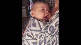 A mother's love: Mom sings baby to sleep