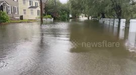 Strolling through flooded South Carolina street after hurricane Ian