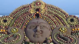 Sand Artist created Devi Durga with installation of different Fruits