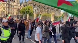Thousands of Mahsa Amini protesters gather in Parliament Square