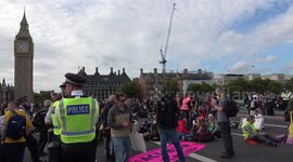 Climate protesters block Westminster and Lambeth bridges in London