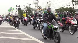 Candidate Jair Bolsonaro joins motorcycle convoy for last-day campaigning in Brazil