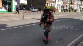 Firefighter running London Marathon with all his equipment