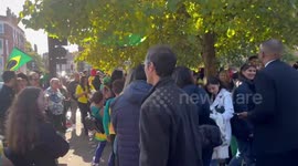 Brazilians queue in Barons Court, London to vote in the Brazilian elections