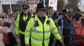 1.8M views on Twitter: MP Jacob Rees-Mogg HECKLED and CHASED by protesters and bundled away by cops as he arrives at Tory Party Conference in Birmingham