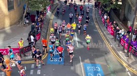 The World's Famous TCS London Marathon Participants Seen Racing Past Canary Wharf