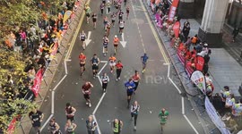 The London Marathon as seen from a bridge in Canary Wharf