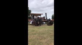 Steam powered engine rolled passed and stopped us dead in our tracks