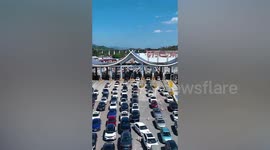 Thousands of vehicles locked in traffic as China's national holiday begins