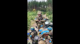 Ukrainian soldiers gather in prayer before military offensive