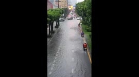 Bangkok streets flood as heavy rain hits the capital