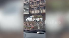 Dozens of wild monkeys ransack pickup truck carrying bananas