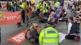 Police attempt to move Just Stop Oil protesters occupying Trafalgar Square