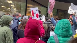 People singing during rally for Mahsa Amini in New York, US