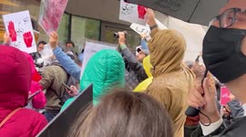 Sign and chants for freedom during rally for Mahsa Amini in New York City