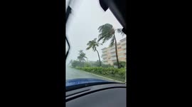 Driving in tropical storm weather as hurricane Ian approaches