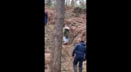Woman goes 'on a roll' while trying to walk down a tricky hill