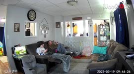 Girl minding her own business gets smacked in the head by wall clock