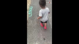 Boy comically tries to pull his feet up with his hands when mom asks him to pick up his feet while running