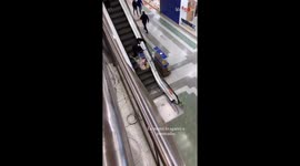 Boy uses regular escalator for his loaded shopping cart *HE REGRETTED IT!*