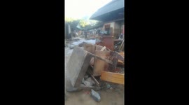 Flash floods flush furniture out of residents' homes in Vietnam