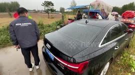 Wedding convoy makes way for funeral procession after meeting on narrow road in China