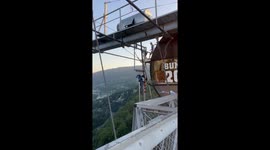 Daredevil laughs in the face of fear by diving off an INSANELY HIGH bridge