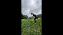 Athlete celebrates after 'double jumping' over stick in mid-air