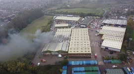 Aerial footage of warehouse fire in Fazeley, Tamworth, UK