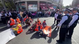 Just Stop Oil activists block road in Trafalgar Square
