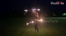 3x Guinness Record Holder turns up the heat by performing with flaming hula hoops