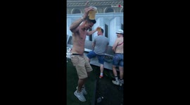 Drunk individuals hilariously trip and fall while walking down slippery slope