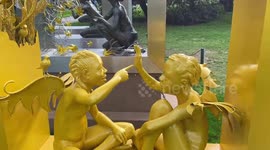 Frieze Sculpture 2022 in The Regent's Park, London. Sculpture by the artist Péju Alatise, Sim and the Yellow Glass Birds, 2022 (kó Art Space, Lagos, Nigeria). The free public art exhibition.
